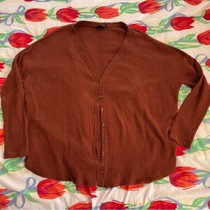 out from under cardigan